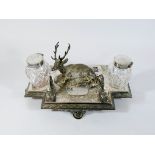 A Victorian silver plated desk stand decorated with a recumbent stag with later presentation