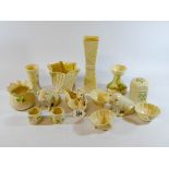 Fourteen pieces of Belleek china to include vases, a swan,