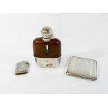 Three pieces of hallmarked silver to include a leather mounted hip flask, compact and Vesta case,