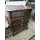 A Stag minstrel mahogany bedside chest fitted four drawers
