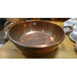A heavy copper preserve pan
