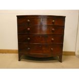 A late Georgian mahogany bow front chest of three long and two short drawers with later Victorian