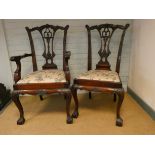 A set of six good quality Chippendale style mahogany dining room chairs standing on claw and ball