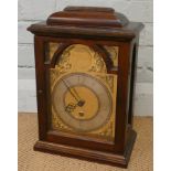 A Georgian style reproduction bracket clock with fusee movement, brass and silver arched dial,