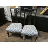 A pair of Edwardian low seat occasional chairs with blue upholstered seats