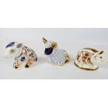 A collection of three Royal Crown Derby paperweights to include Lamb,