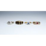 A collection of four antique rings to include 18ct sapphire and diamond cluster and two garnet