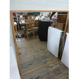 A very large wall mirror in pine frame 51" x 45"