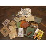 A mixed lot of cigarette cards, stamps, ephemera, old children's albums,