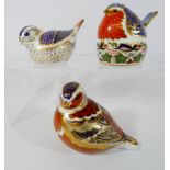A collection of three Royal Crown Derby paperweight birds, to include,