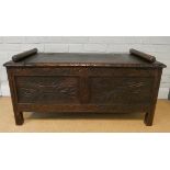 A caved dark oak hall seat lift top coffer 41" wide