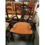 Edwardian mahogany elbow chair on cabriole legs with terracotta upholstered seat