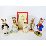 A group of five Royal Doulton Bunnykins figures: Bath Time, Cook, The Easter Parade,
