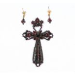 Antique Bohemian garnet set cross pendant with closed back settings,