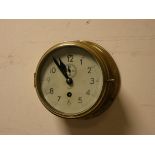 A pilot circular brass ships wall clock