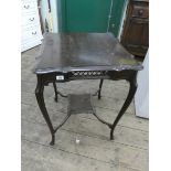 A square Edwardian mahogany occasional table with under tier