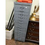 A fifteen drawer metal filing cabinet