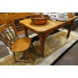 Victorian style stripped pine kitchen table on turned legs approx 5' x 3' and two odd pine Windsor