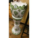 A green china jardiniere with matching pedestal