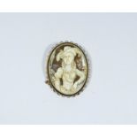 Oval carved shell cameo depicting 17th century lady in a 9ct yellow gold frame