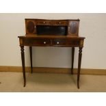 An Edwardian style inlaid mahogany bow front ladies Carlton House style desk with cupboard and