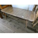 A long Ercol oak coffee table (needs polish)