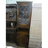 Old Charm reproduction oak leaded glazed bookcase fitted two drawers and cupboards under with linen