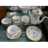 A Royal Albert Antoinette patterned gilt decorated bone china tea set for five people