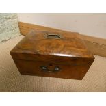 A Victorian walnut dome top trinket box with slide out section