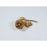Mid-20th century 18ct gold ruby and diamond rose spray brooch,