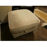 A square cream upholstered boxed poufee