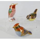 A collection of three Royal Crown Derby bird paperweights to include humming bird,