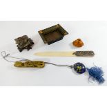 A collection of antique oriental items to include letter opener, cloisonne pendant,