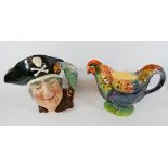 Art Deco Rooster teapot together with a Royal Doulton character jug Long John Silver