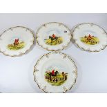 A set of four Royal Crown Derby cabinet plates, each hand painted with a hunting or sporting scene,