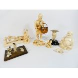 A collection of Meiji period carved Japanese figurines some as found