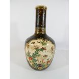 A Kinkozan Satsuma flask with detachable lid decorated with a panel of flowers and insects,