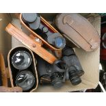 Three pairs of binoculars,