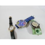 A collection of three modern wristwatches