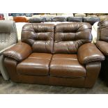 A modern three seater settee in brown leather a matching two seater