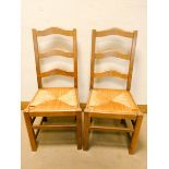 A set of seven ladder back chairs which match the previous six