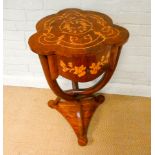 An Italian style walnut and floral marquetry inlaid occasional table on a triple shaped cross
