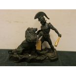 A modern resin green patinated bronze effect figure ornament of a gladiator fighting a lion 14"