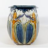 A Royal Doulton Lambeth jardiniere in the Art Nouveau style decorated with snowdrop's,