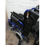 A fold up push along wheelchair