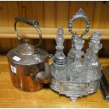 A plated six bottle cruet and a Victorian oval copper kettle