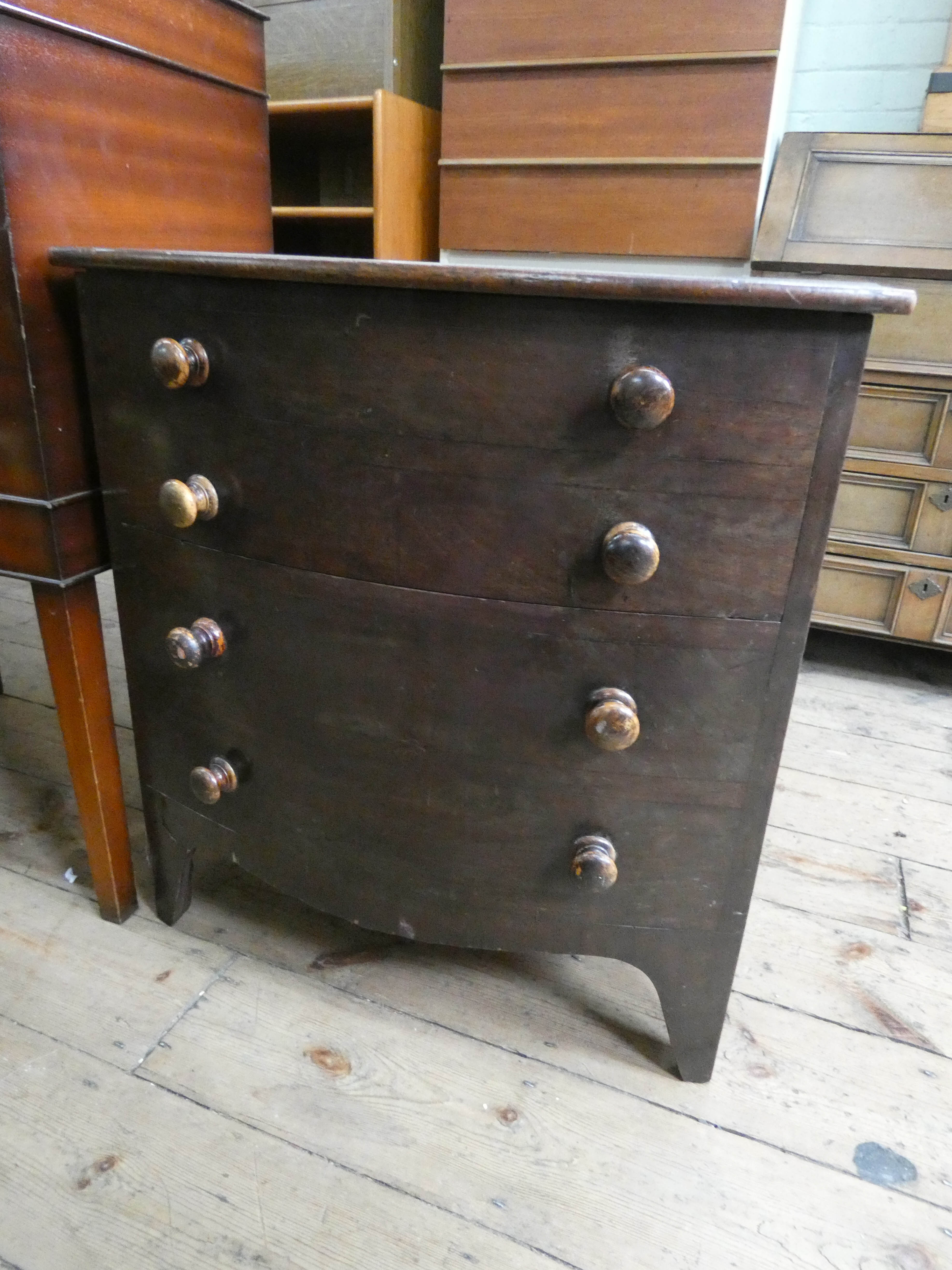 A Georgian mahogany bow front chest of drawers style commode with lift up top complete with liner