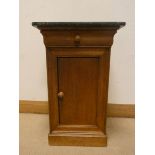A French oak bedside cabinet fitted drawer with black effect marble top