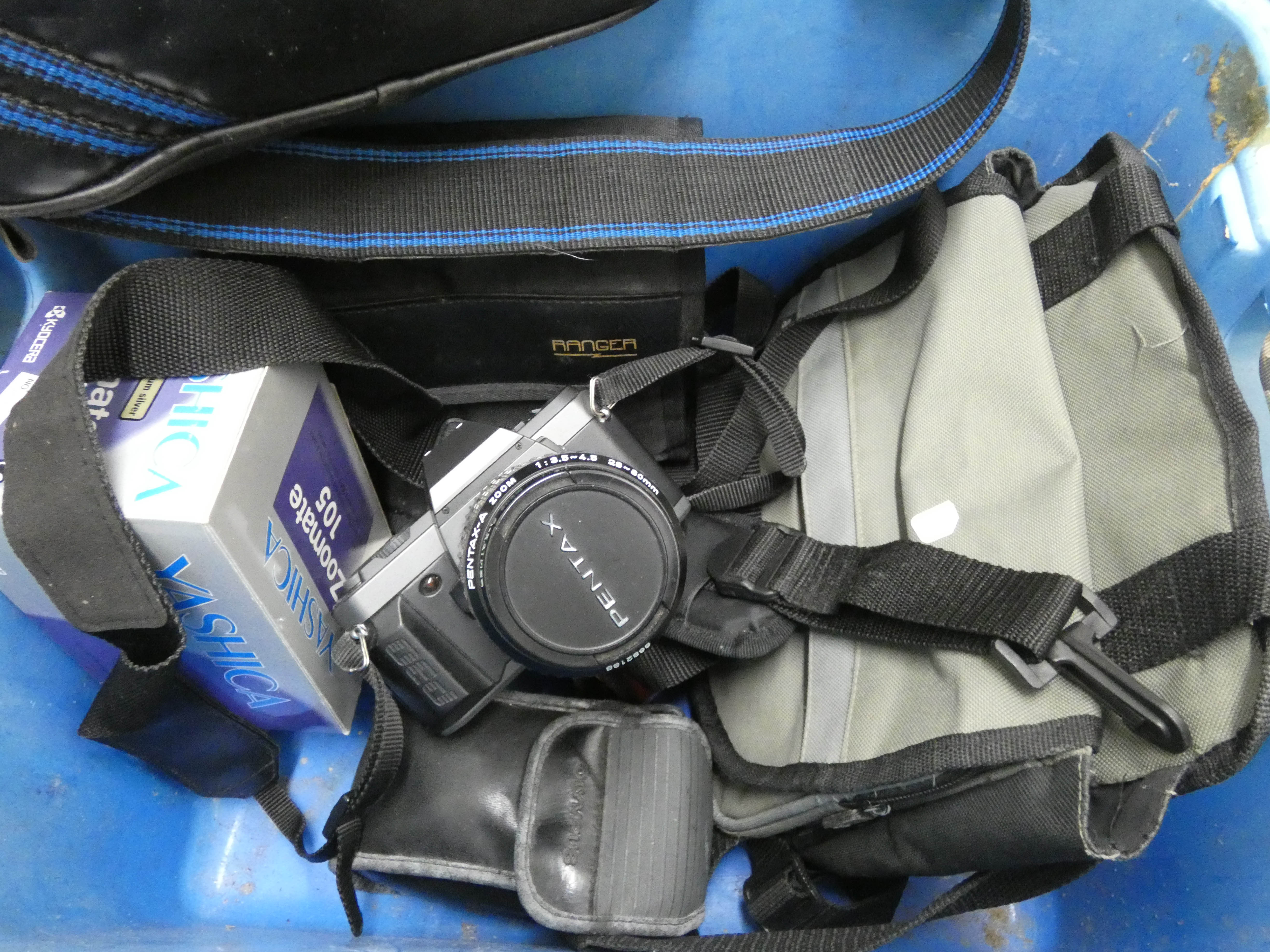 A quantity of cameras, camera accessories,
