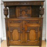 A good quality reproduction carved oak court cupboard with cupboard back,